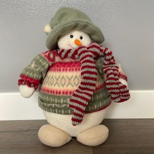 Adorable stuffed snowman.